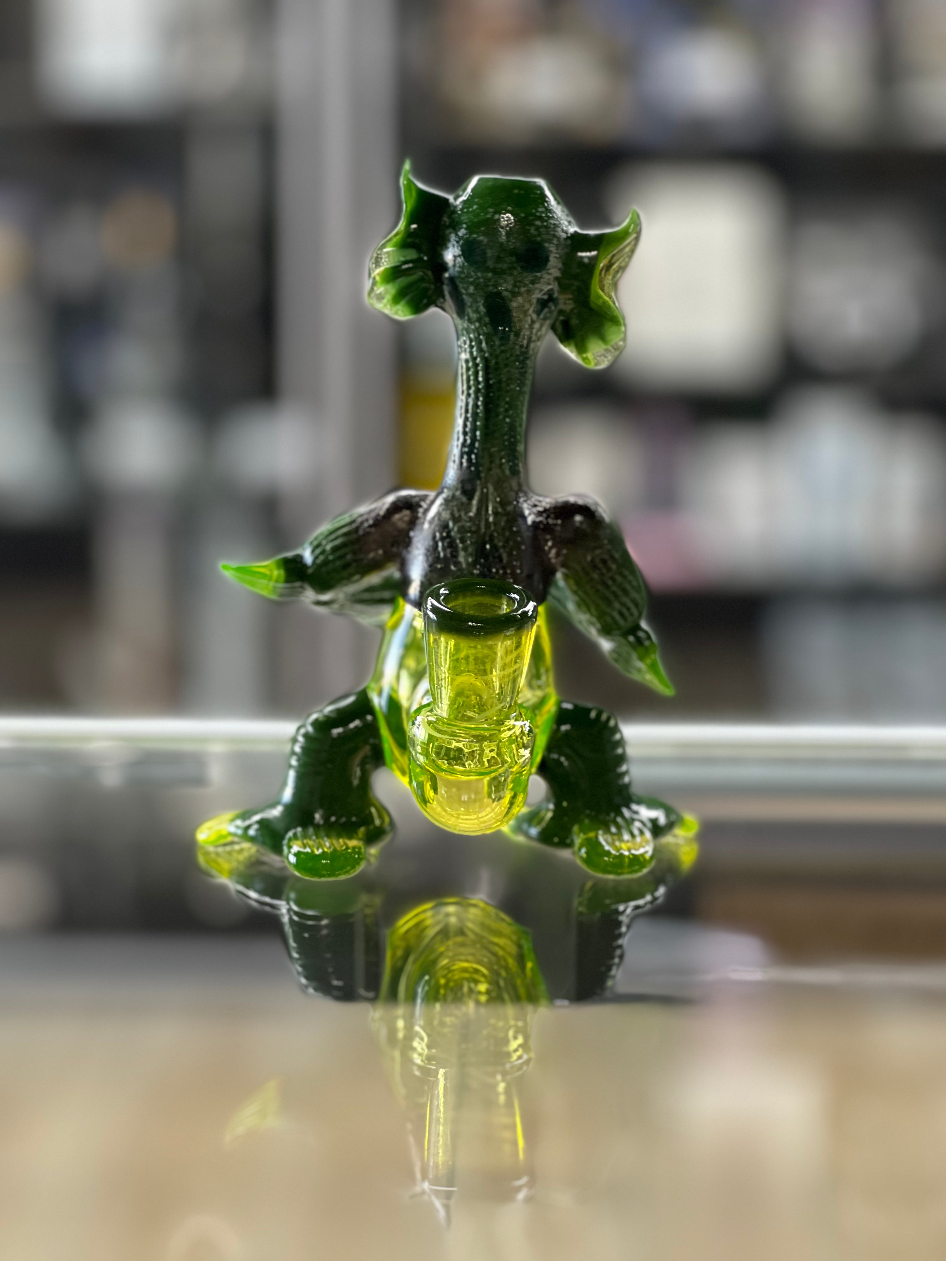 rear view of merc glass alien at hex smoke shop