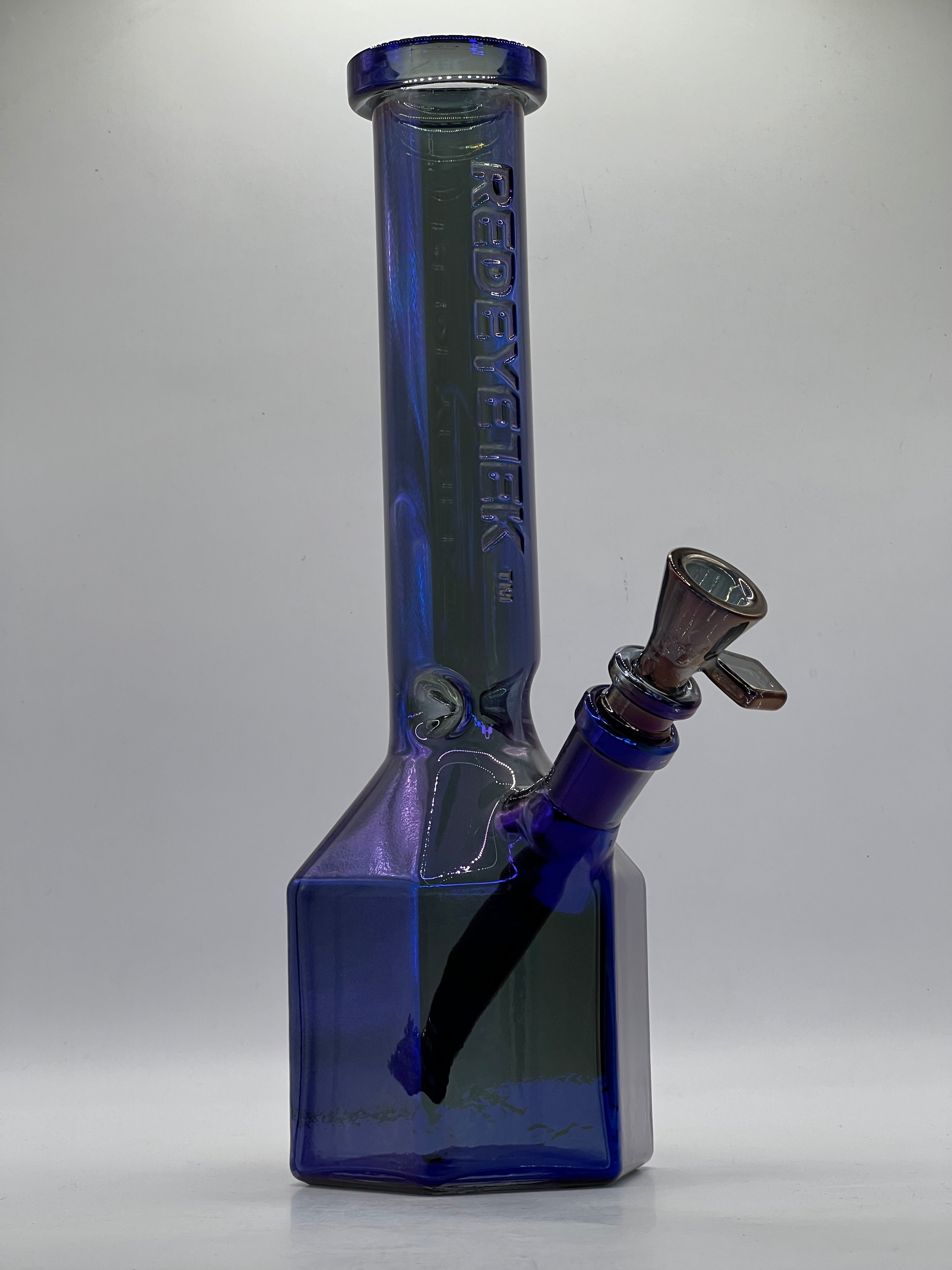 Angled studio view of the metallic blue Prismatic Tube