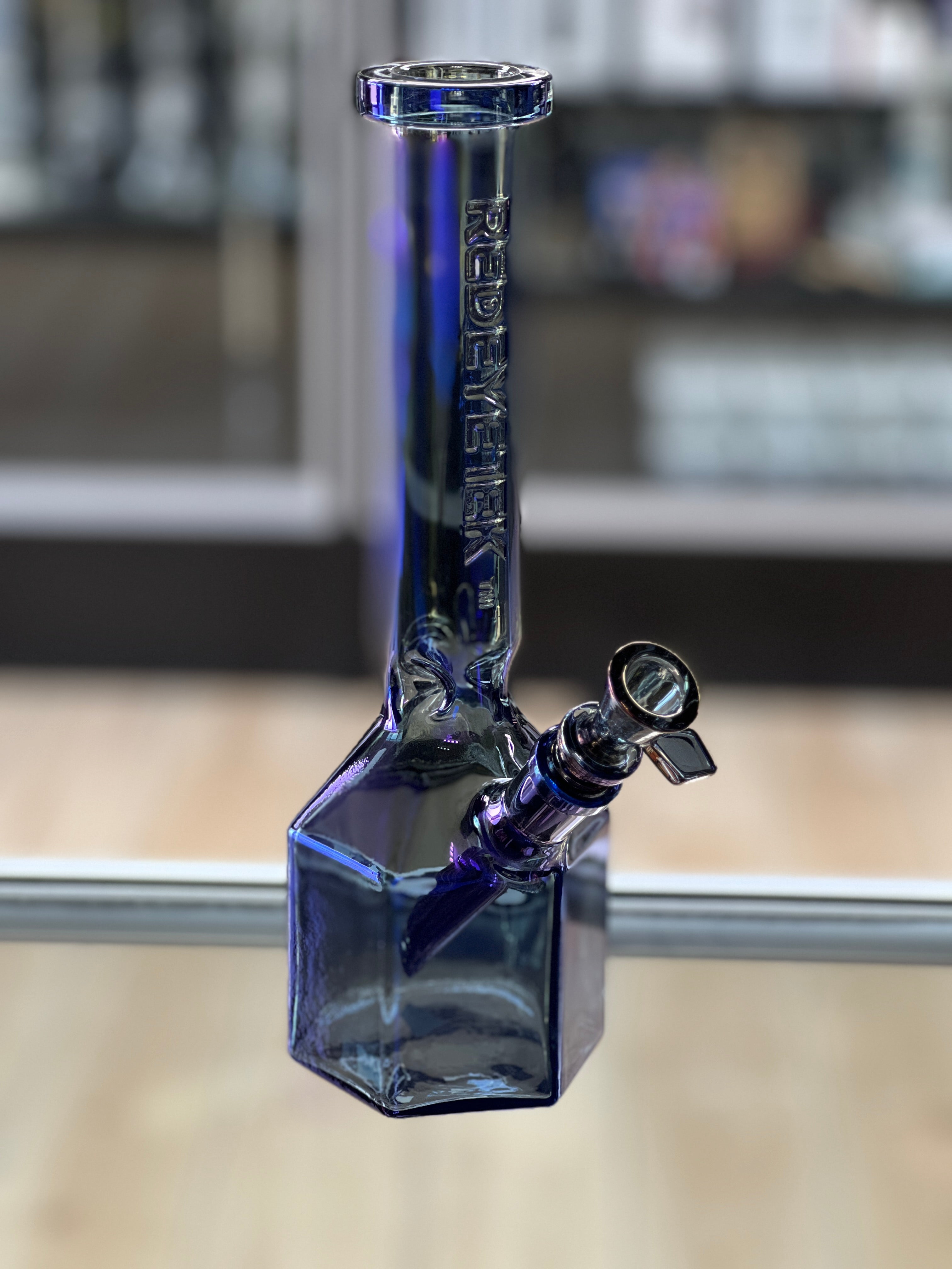 Red Eye Tek Prismatic Tube displayed at Hex Smoke Shop