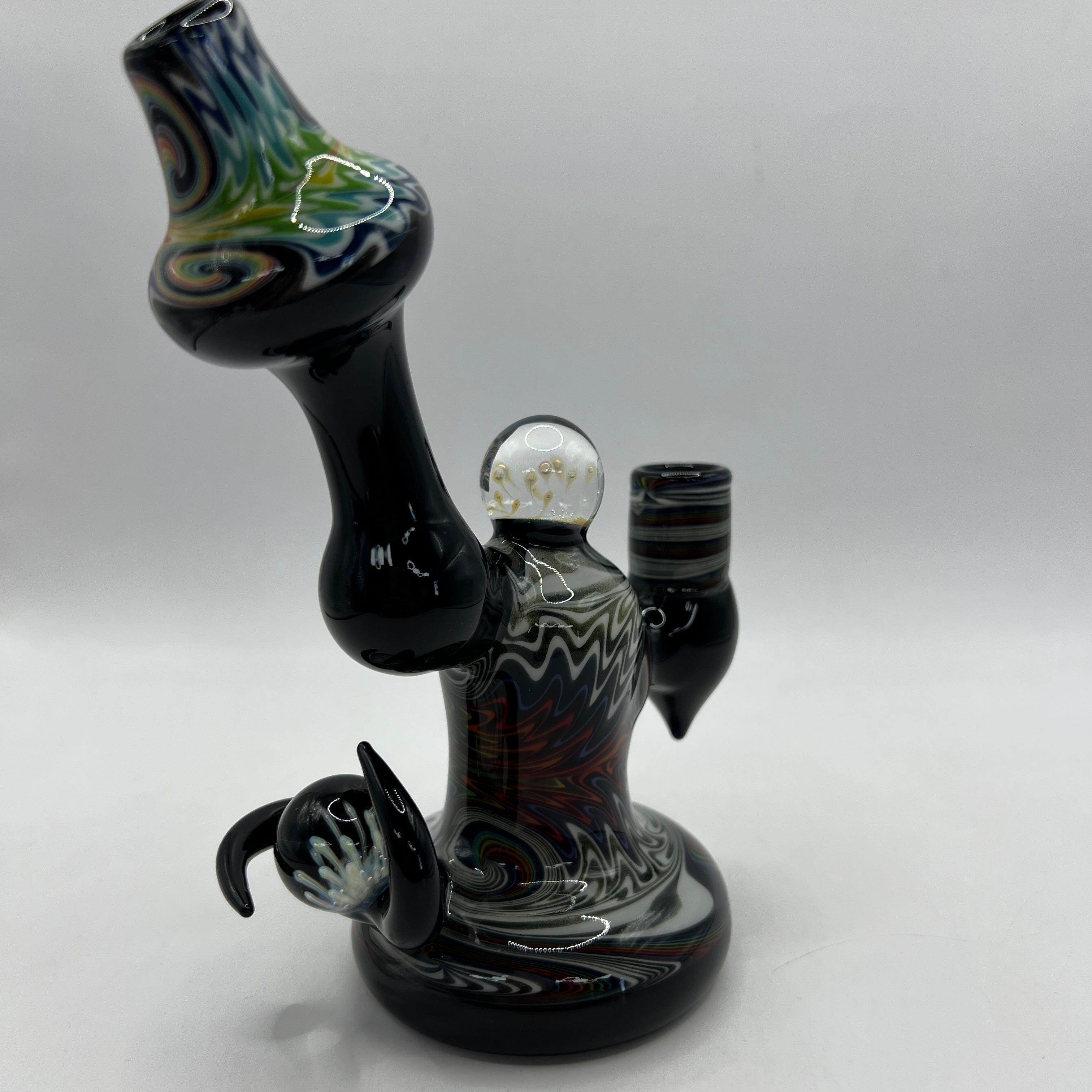 Three-quarter view of handmade Lurch Glass collector rig