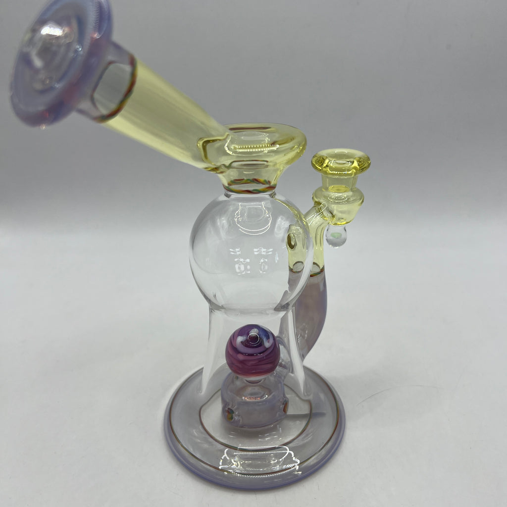 Three-quarter view of custom OM Glass collector rig