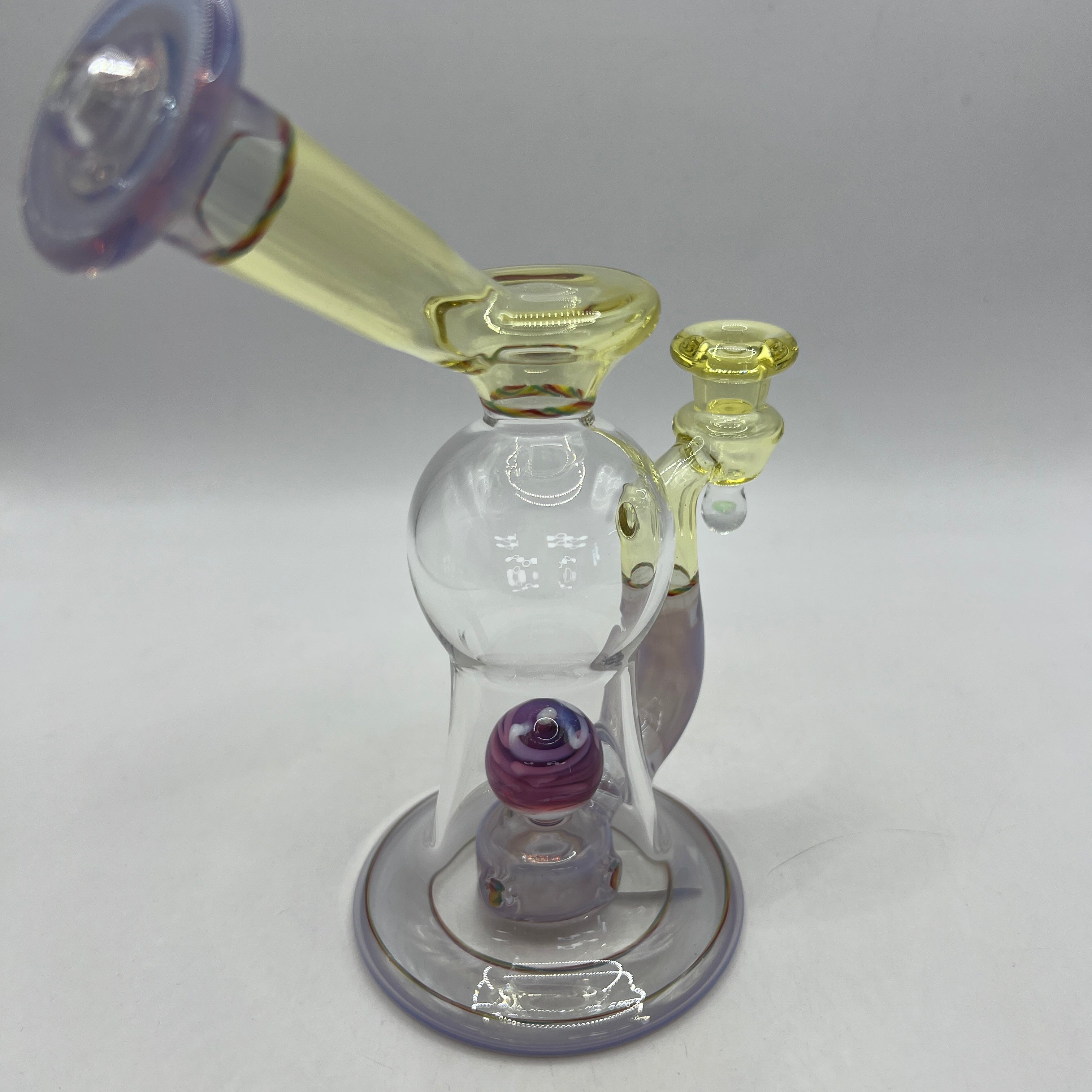 Three-quarter view of custom OM Glass collector rig