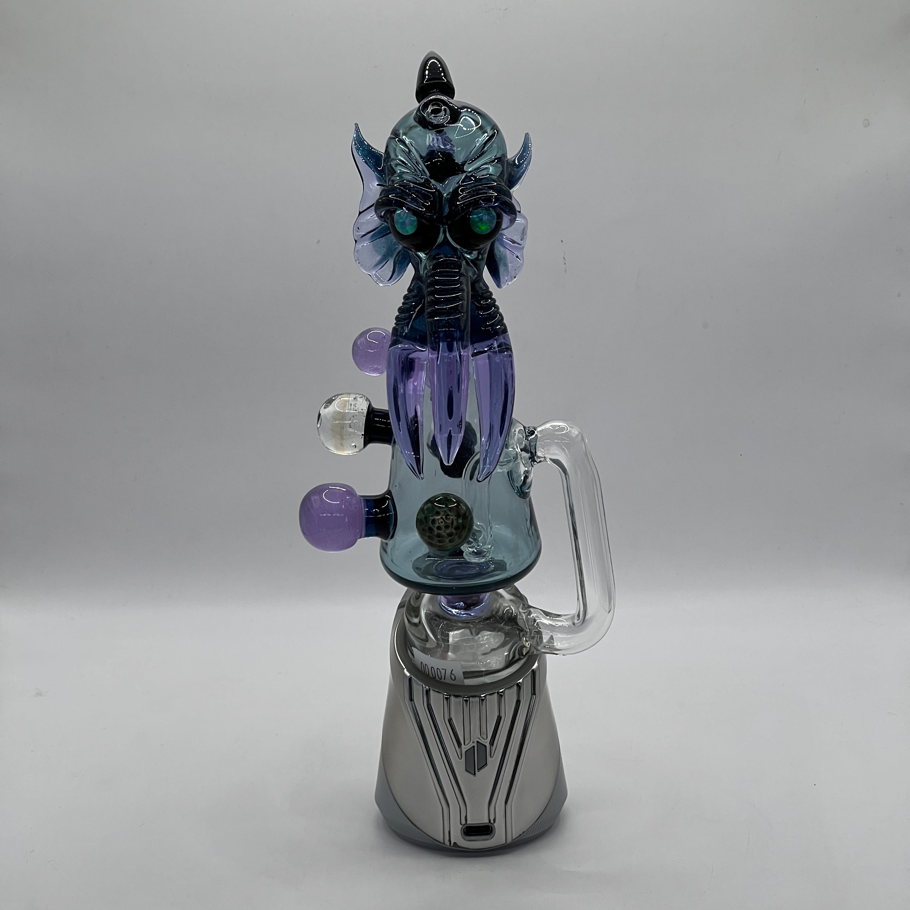 Merc Glass Cthulhu Puffco attachment mounted on Puffco Peak Pro