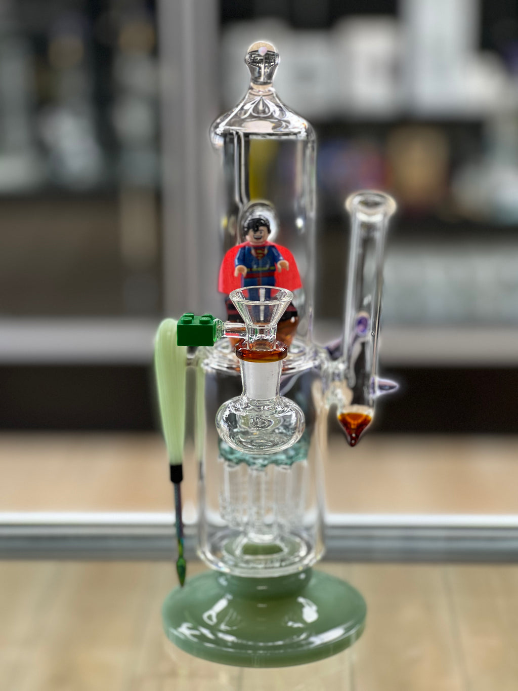 front facing view of the superman water pipe from otg glass at hex smoke shop