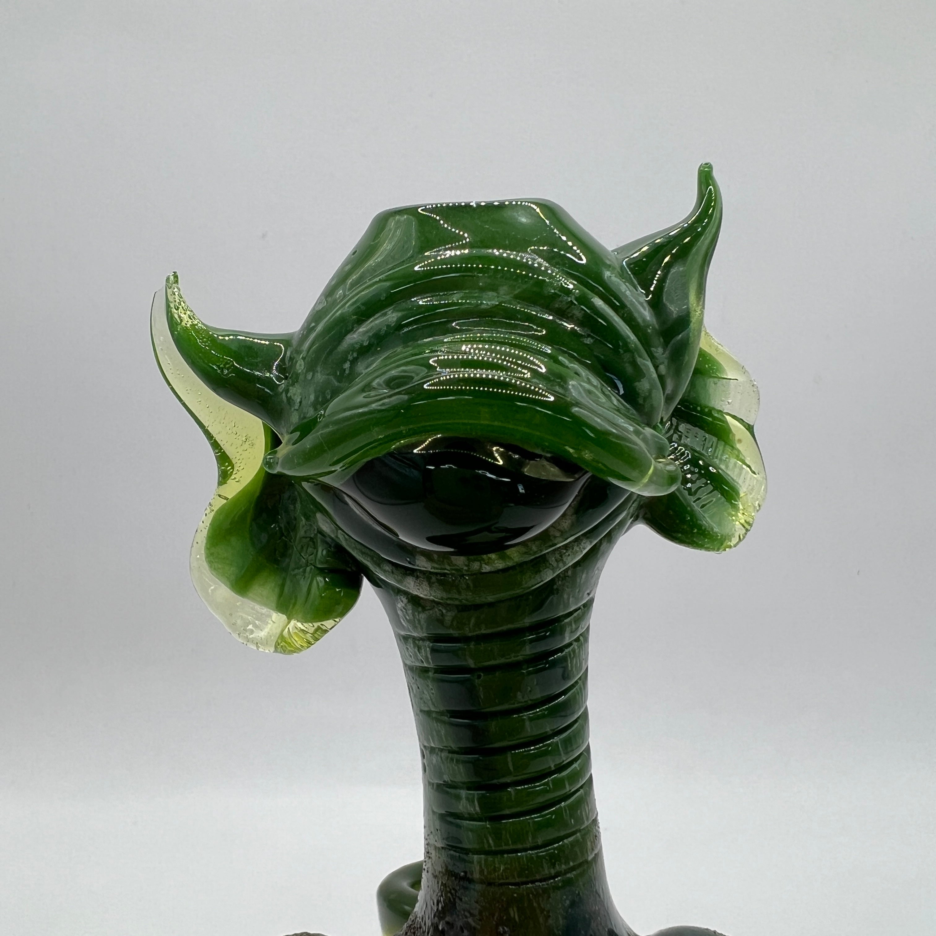 Close-up of Merc Glass Alien Creature sculpted face