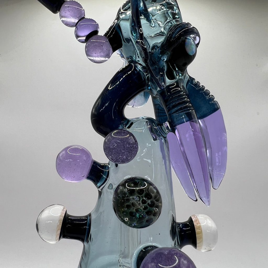 Front view of Merc Glass Cthulhu Puffco attachment