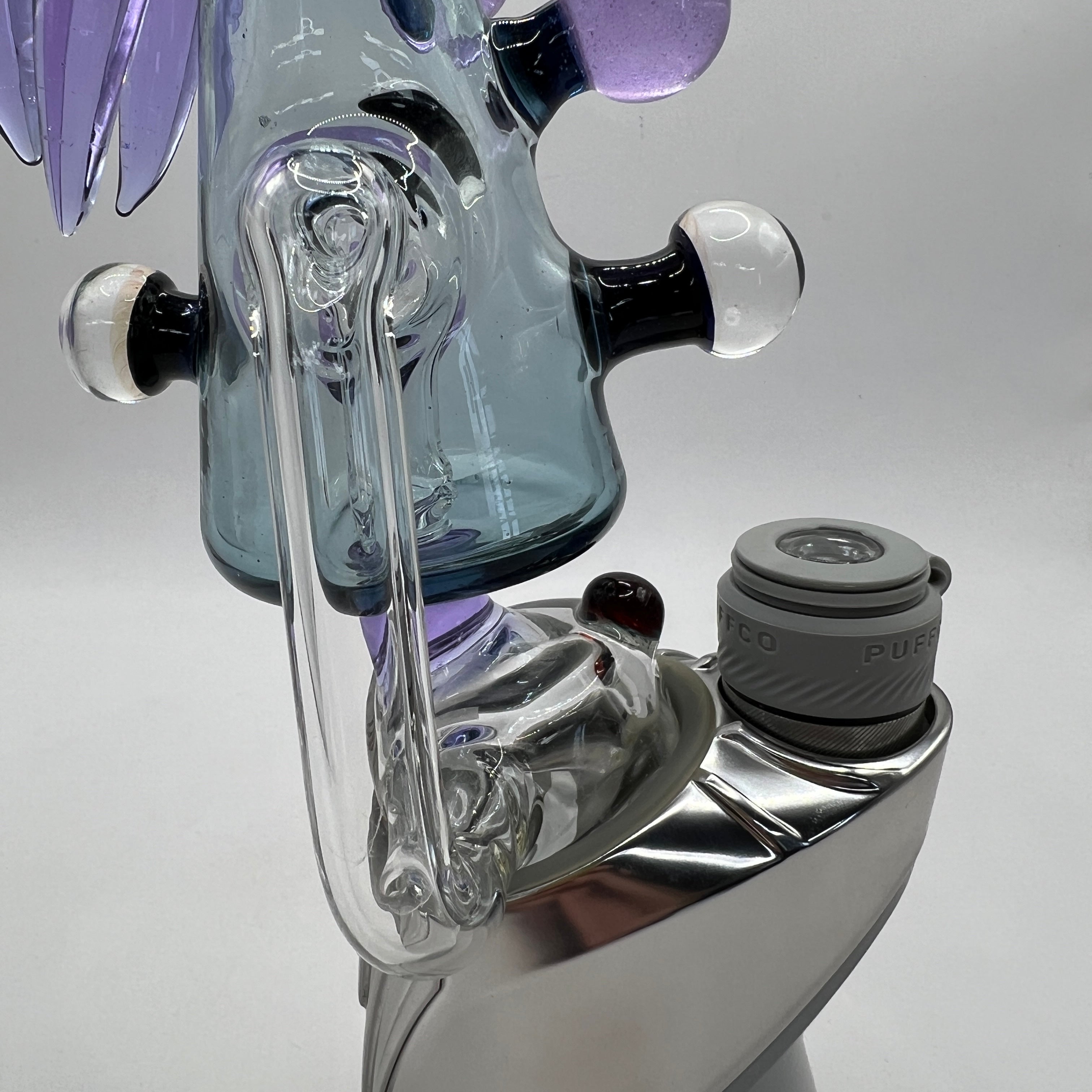 Close-up of Merc Glass Cthulhu Puffco attachment side-channel airflow