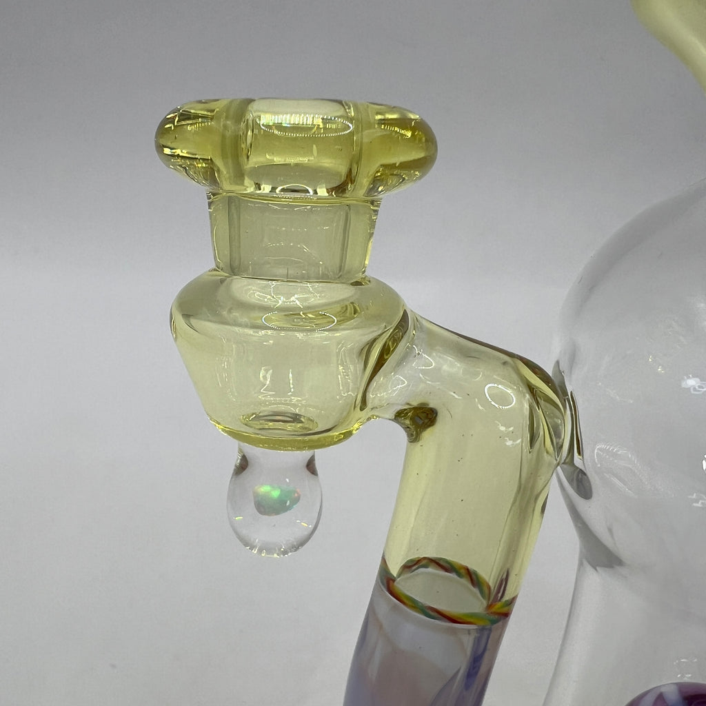 Close-up of custom joint with suspended opal accent