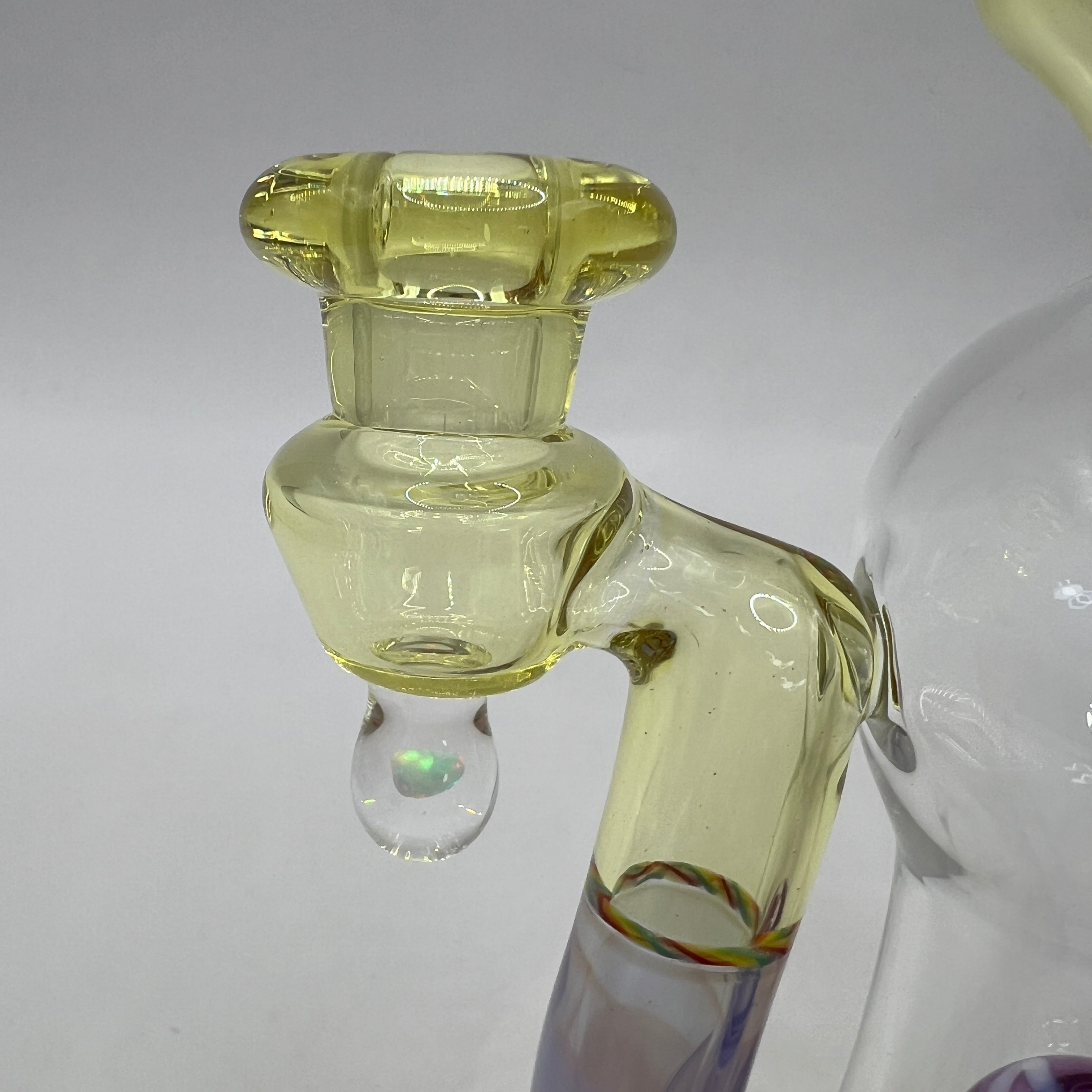 Close-up of custom joint with suspended opal accent
