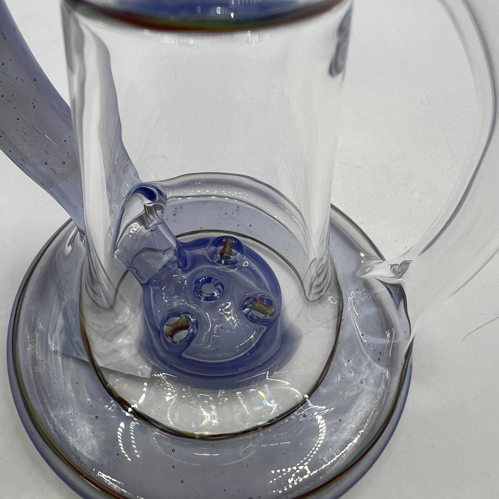 Close-up of four-hole puck percolator inside OM Glass recycler