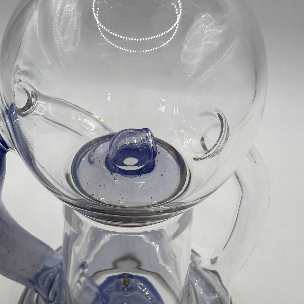 Close-up of floating sphere chamber and recycler function