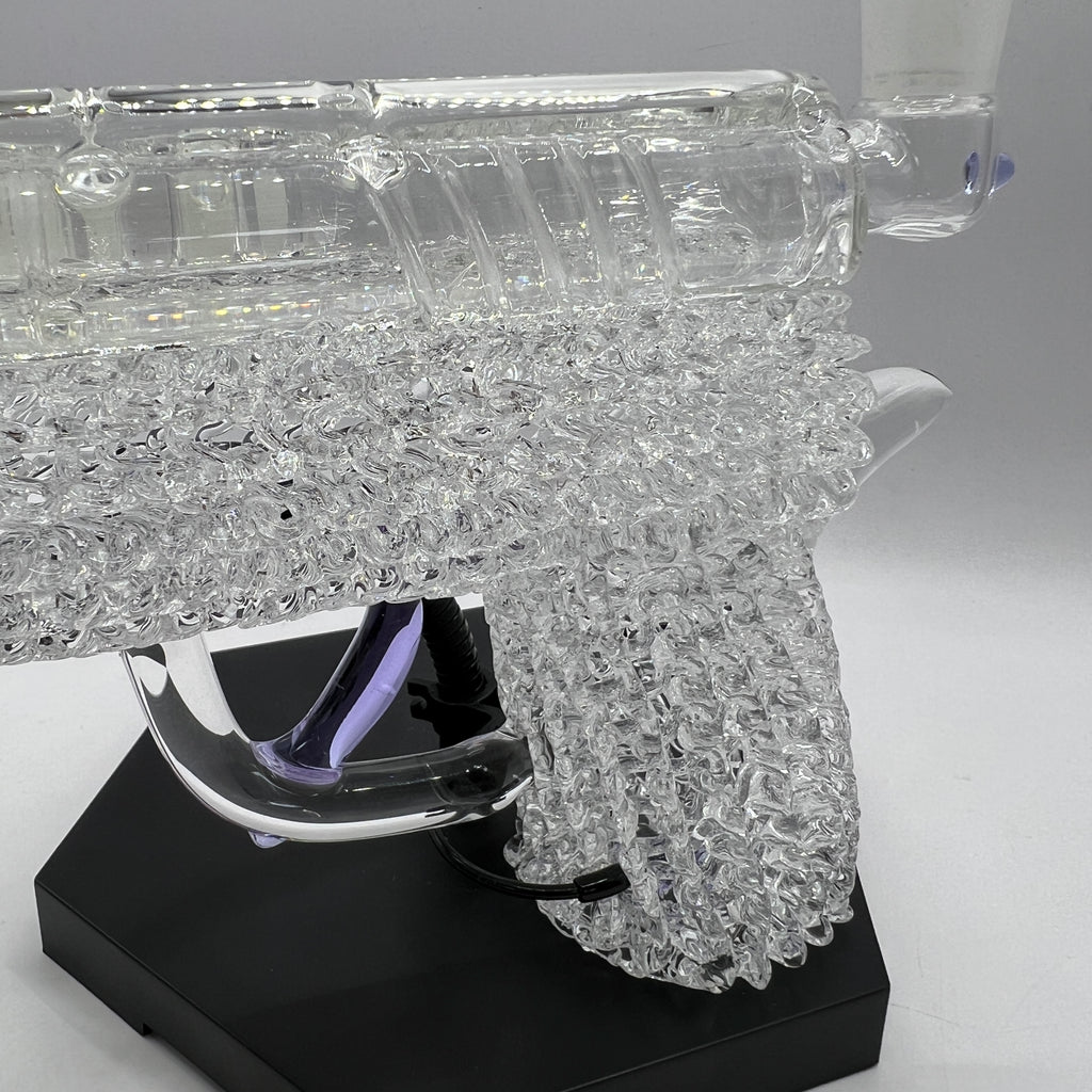 Macro view of the intricate clear chaos texture handcrafted into the OTG Glass collector handgun pipe.