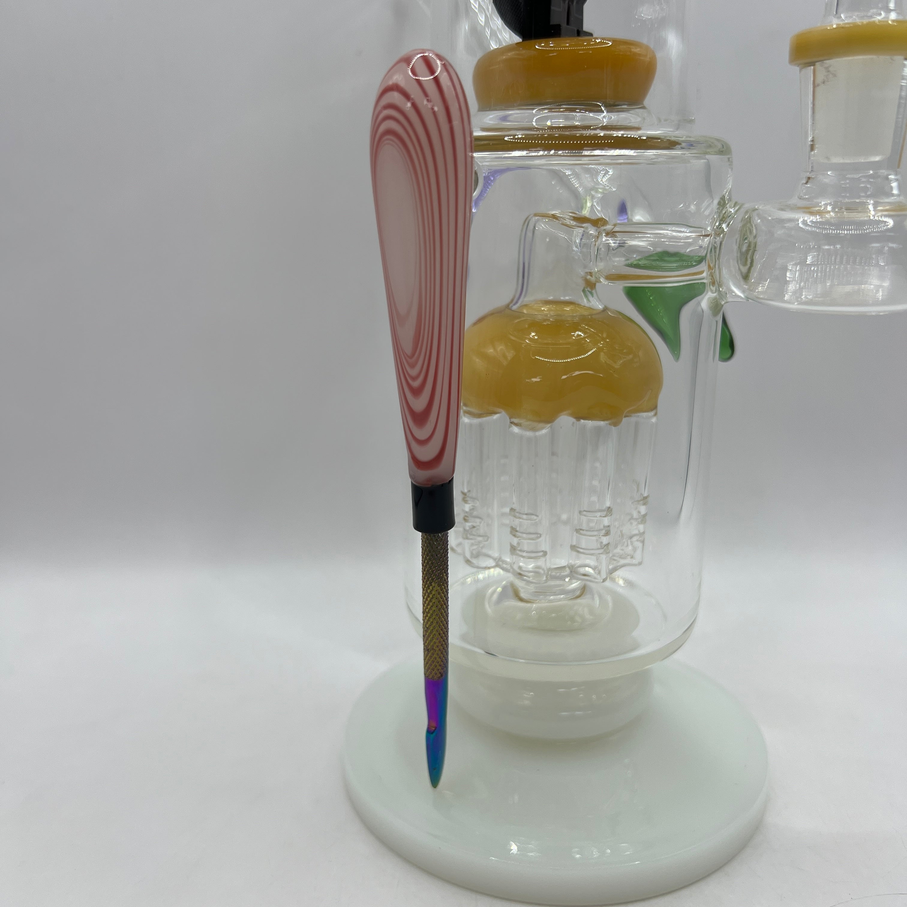 Close-up of magnetic steel packing tool and amber tree percolator