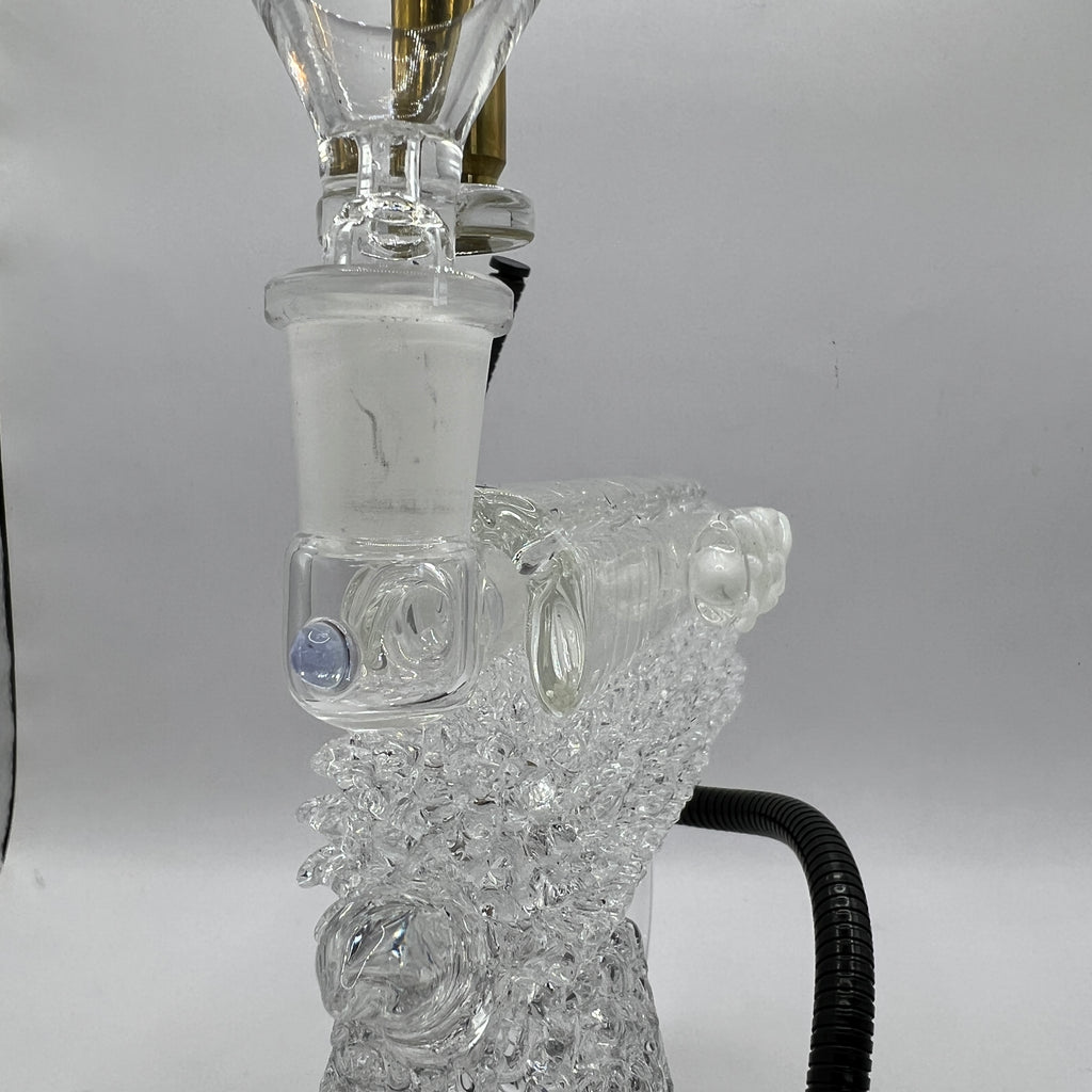 Detailed view of the textured glass grip and handcrafted chaos pattern on the OTG Glass collector handgun pipe.