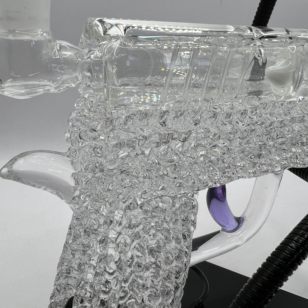 Macro view of the intricate clear chaos texture handcrafted into the OTG Glass collector handgun pipe.