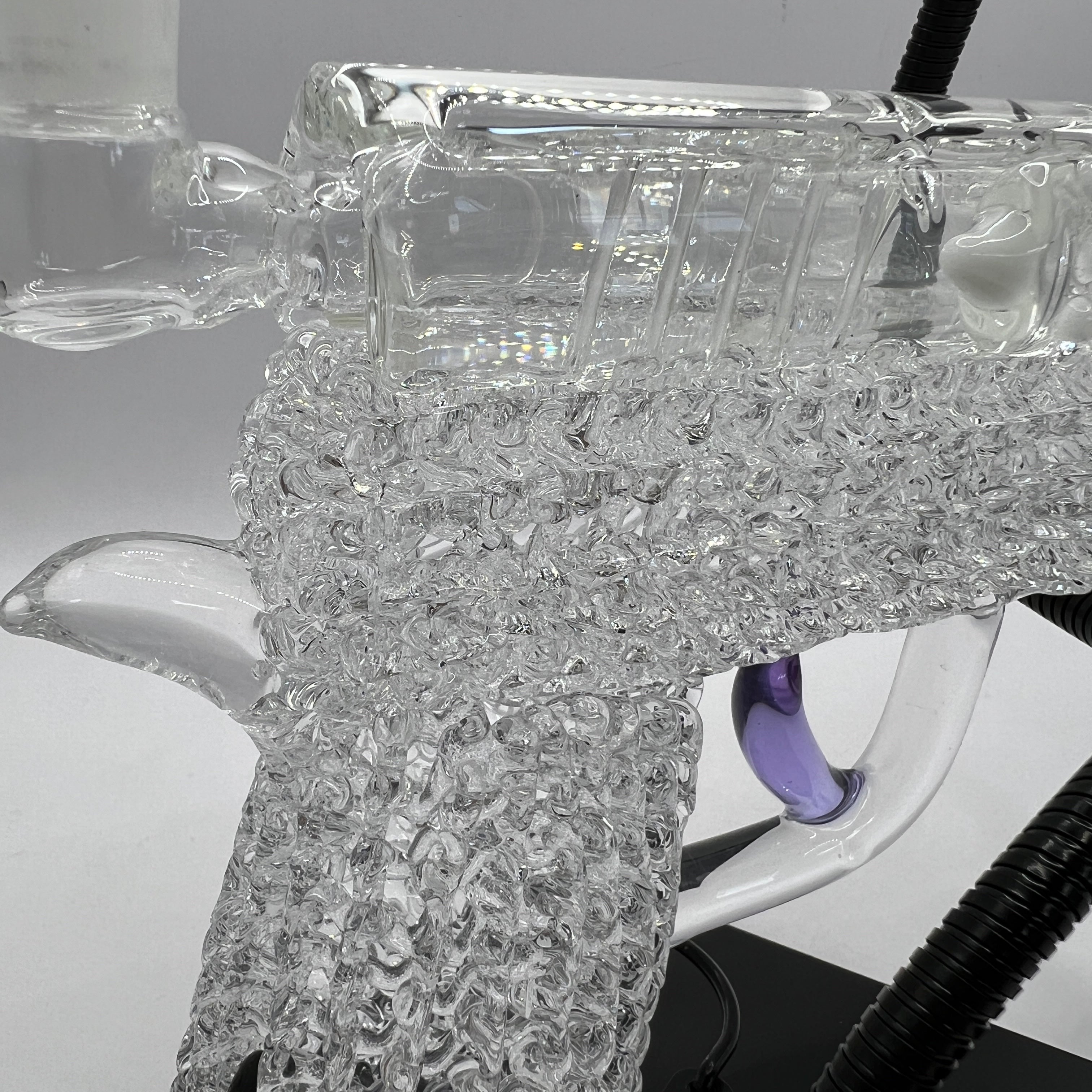 Macro view of the intricate clear chaos texture handcrafted into the OTG Glass collector handgun pipe.