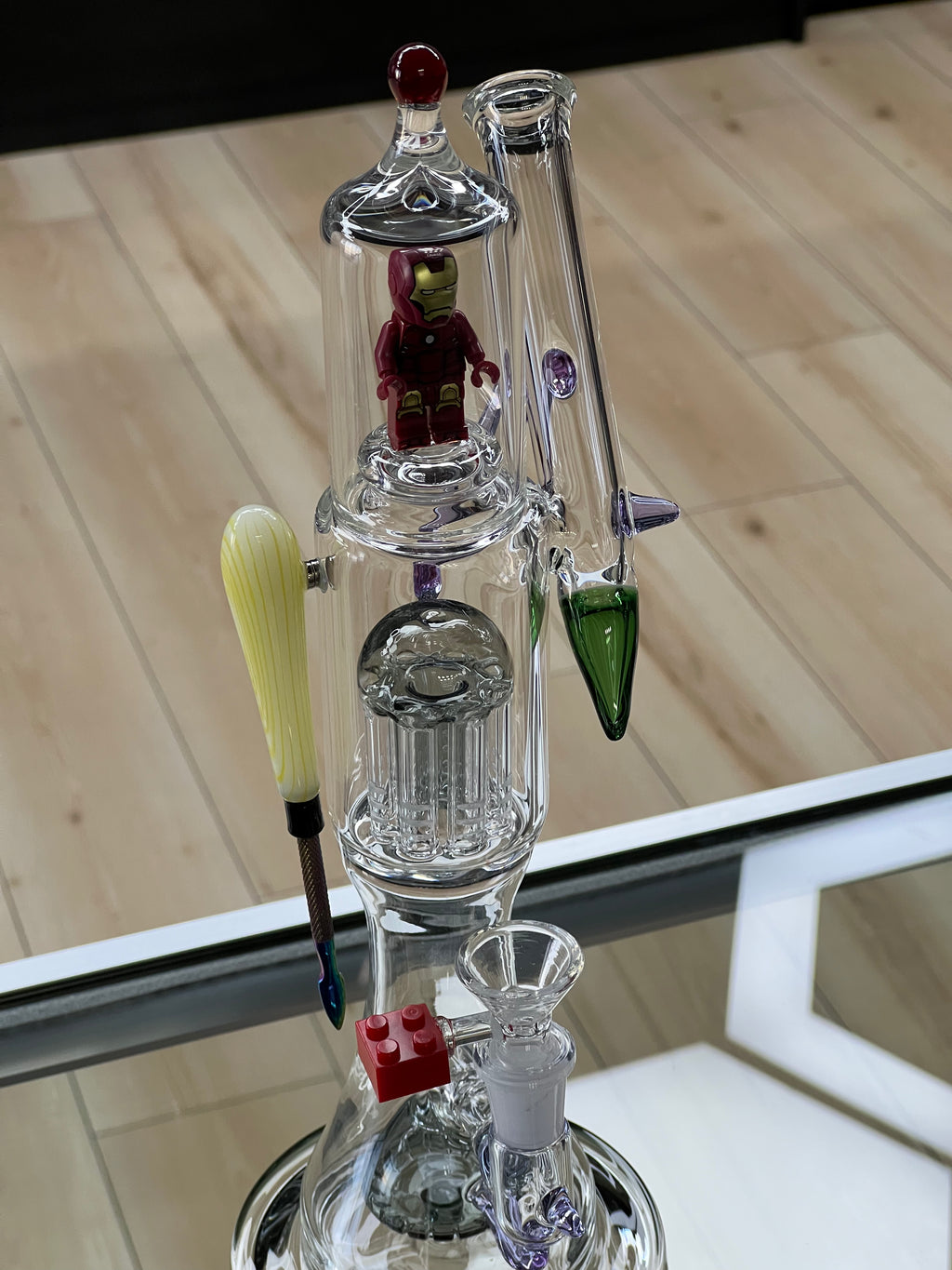otg glass iron man water pipe at display in hex smoke shop