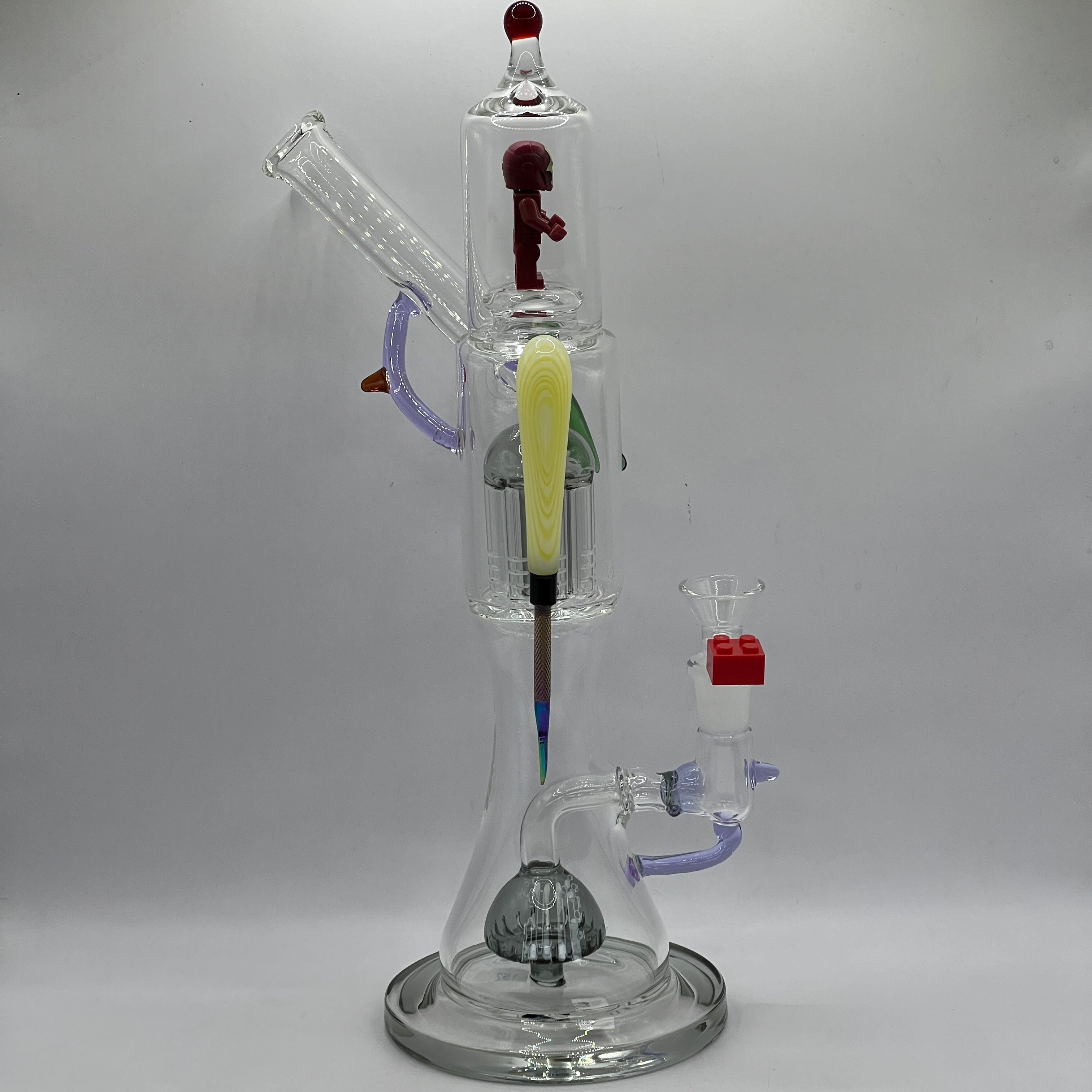 Side view of OTG Glass Iron Man themed collector water pipe
