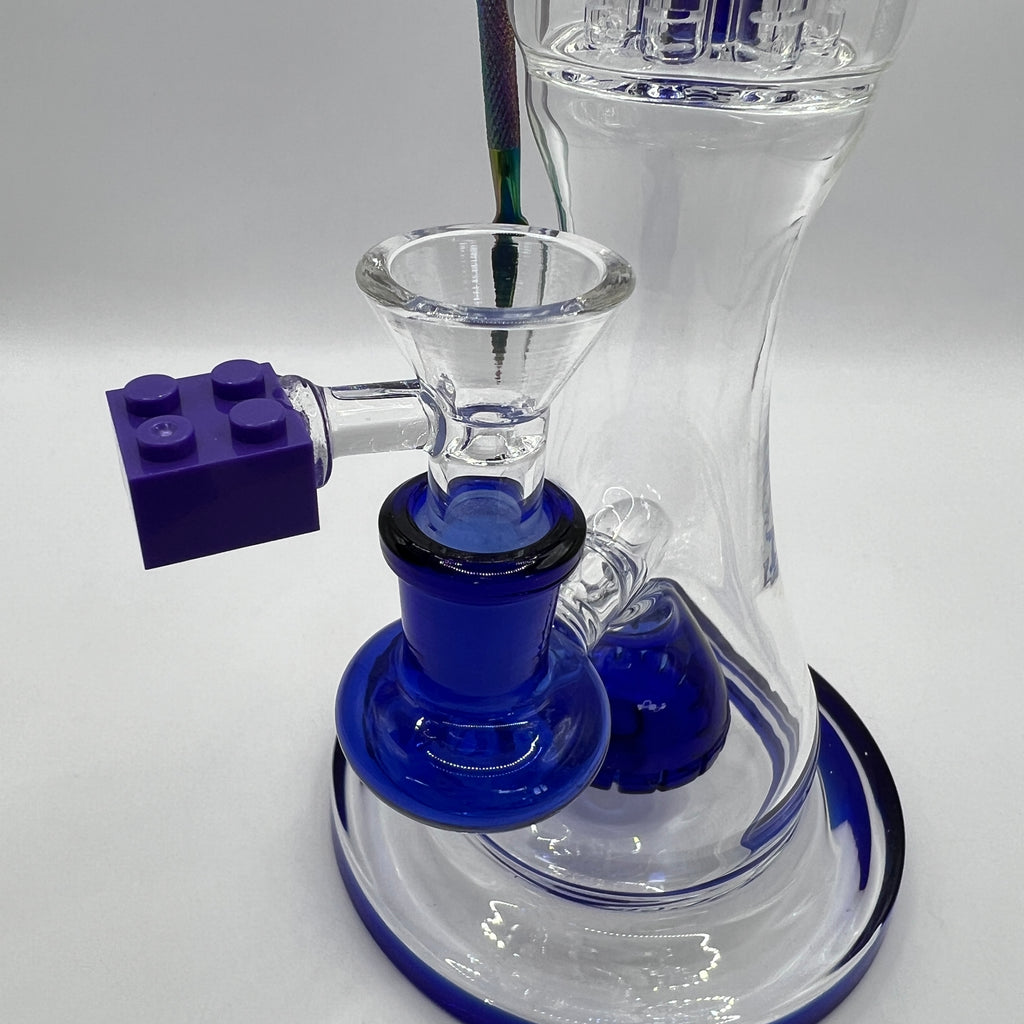 Close-up of LEGO-style bowl handle and blue glass joint
