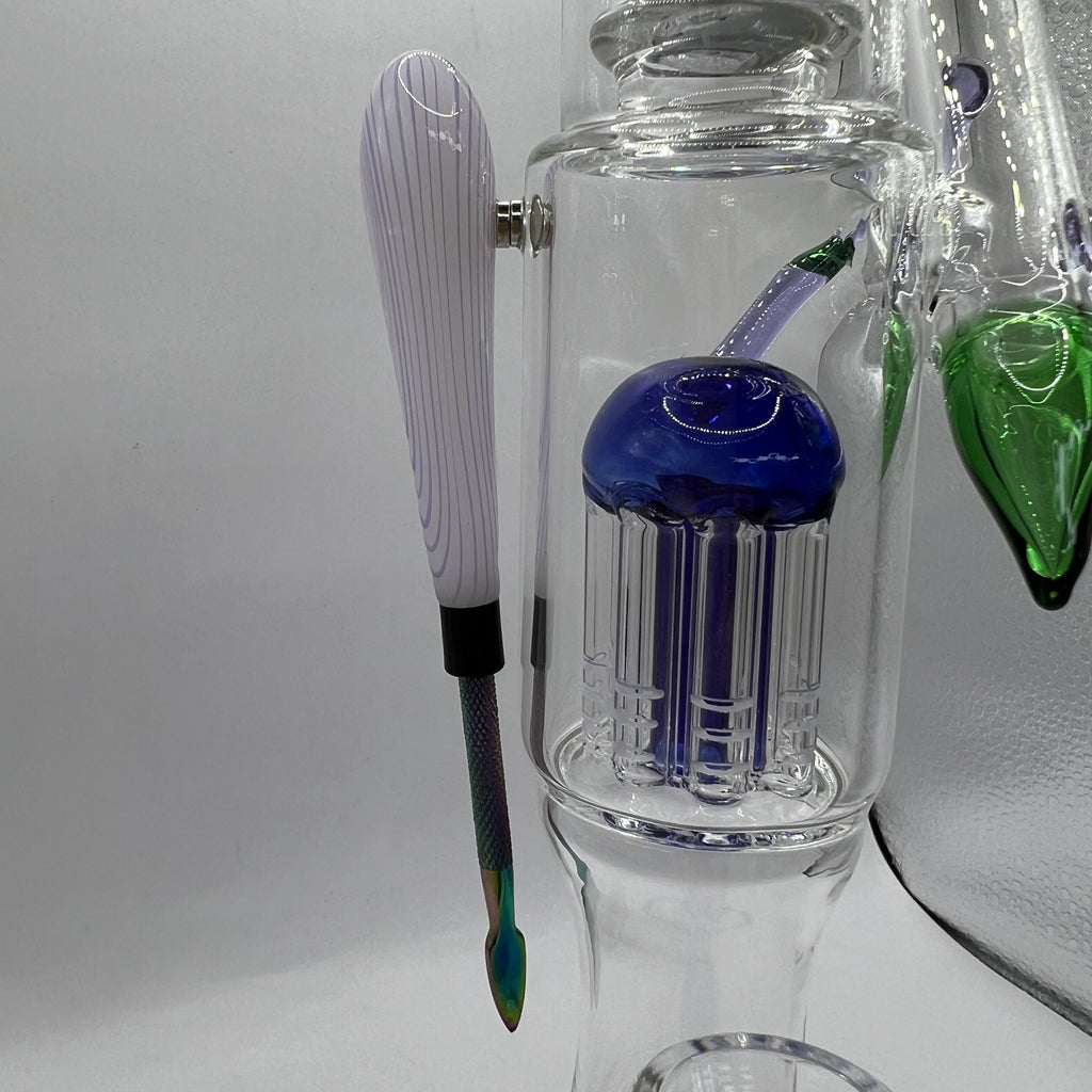 Close-up of magnetic steel tool attached to Mario themed water pipe