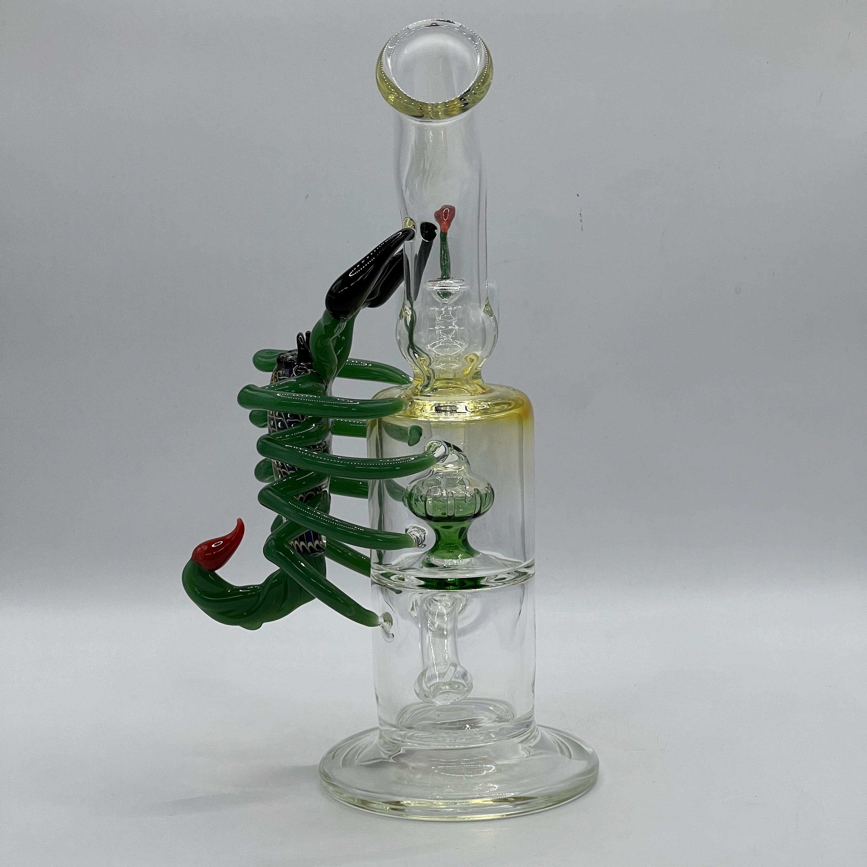 Rear view of OTG Glass scorpion water pipe showing sculpted body and articulated legs