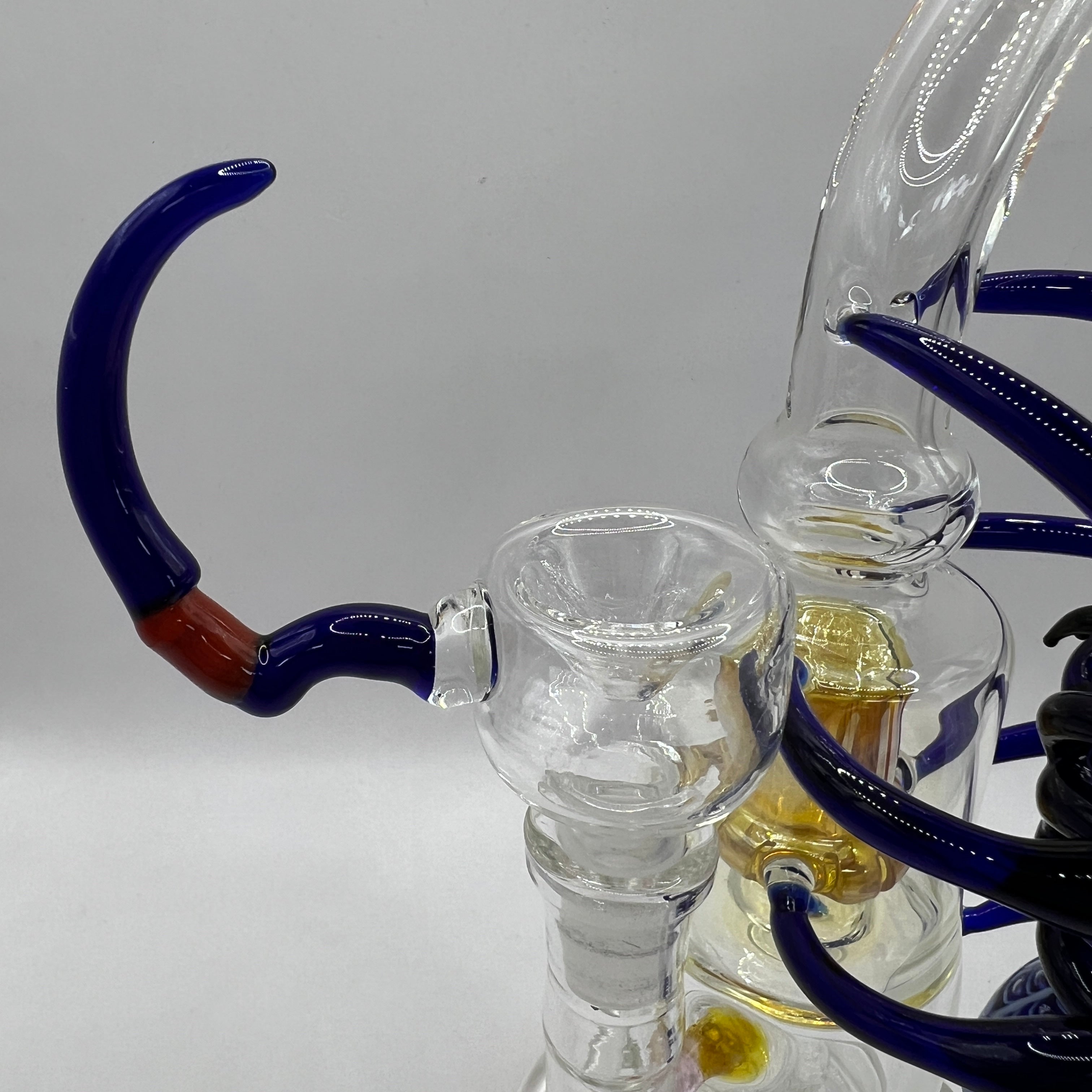 Matching sculpted spider-leg bowl on handcrafted OTG Glass water pipe