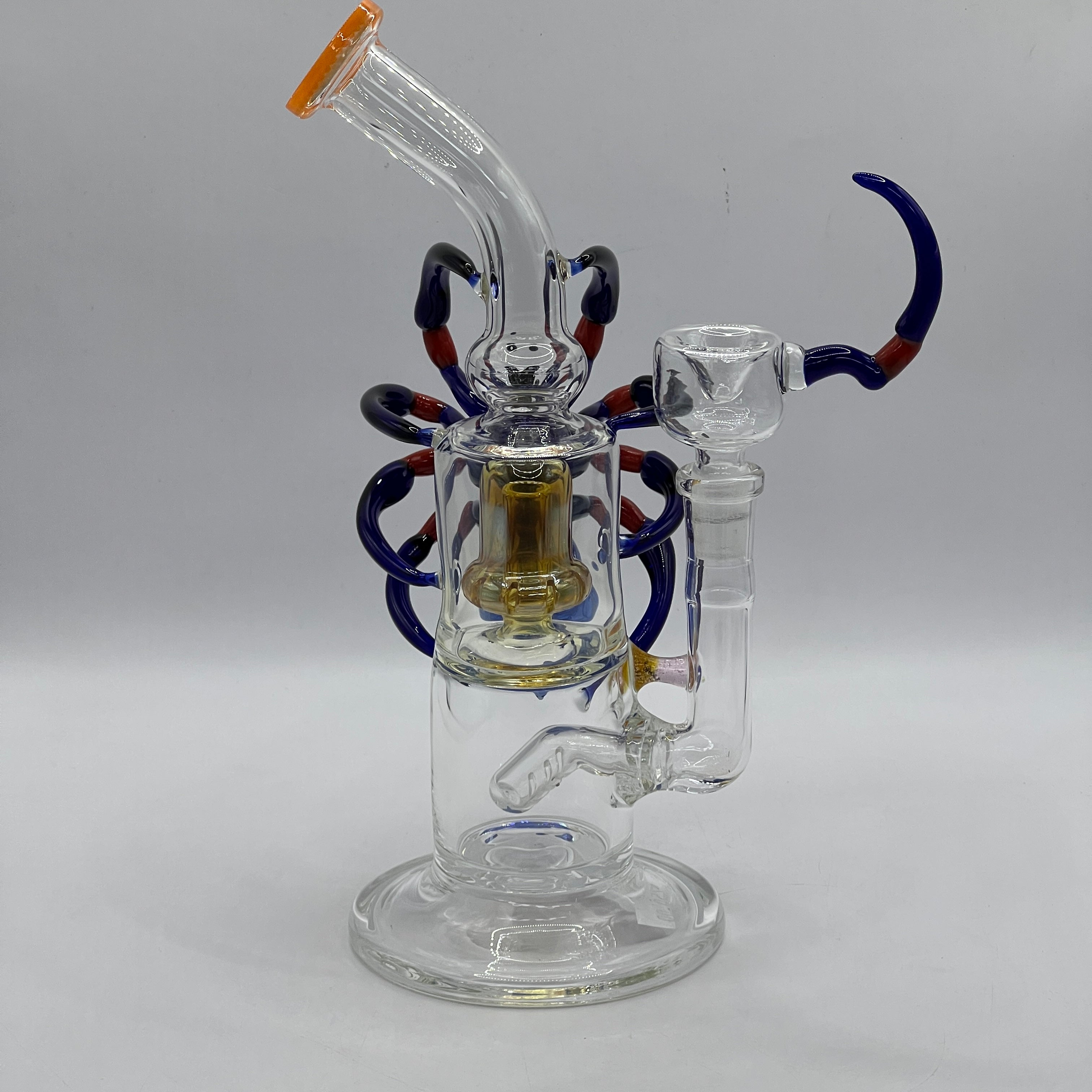 Side profile of OTG Glass spider bong featuring dual chamber filtration and custom sculpted spider artwork
