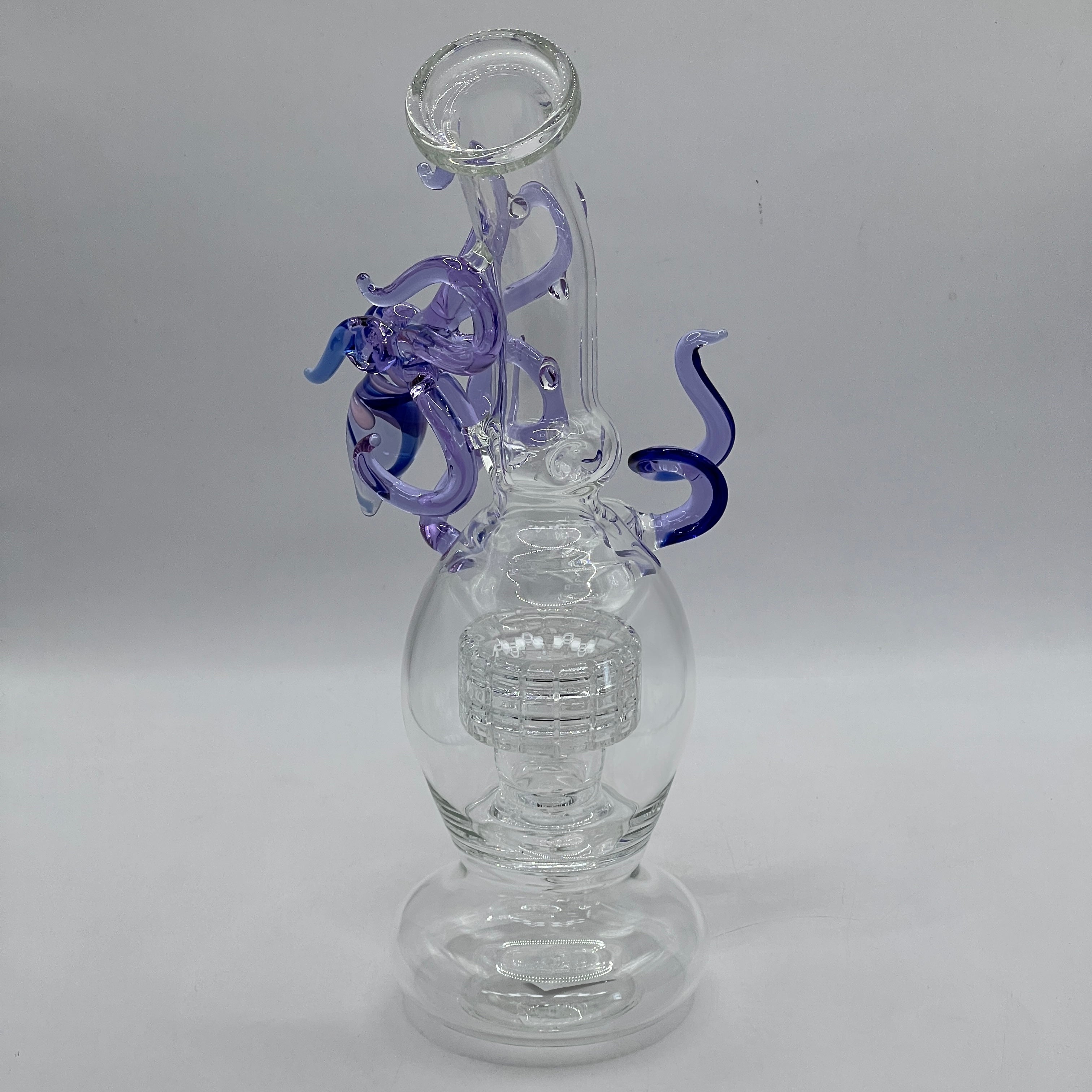 Rear angle of OTG Glass Giant Squid water pipe showing sculpted lavender tentacles wrapping around the neck