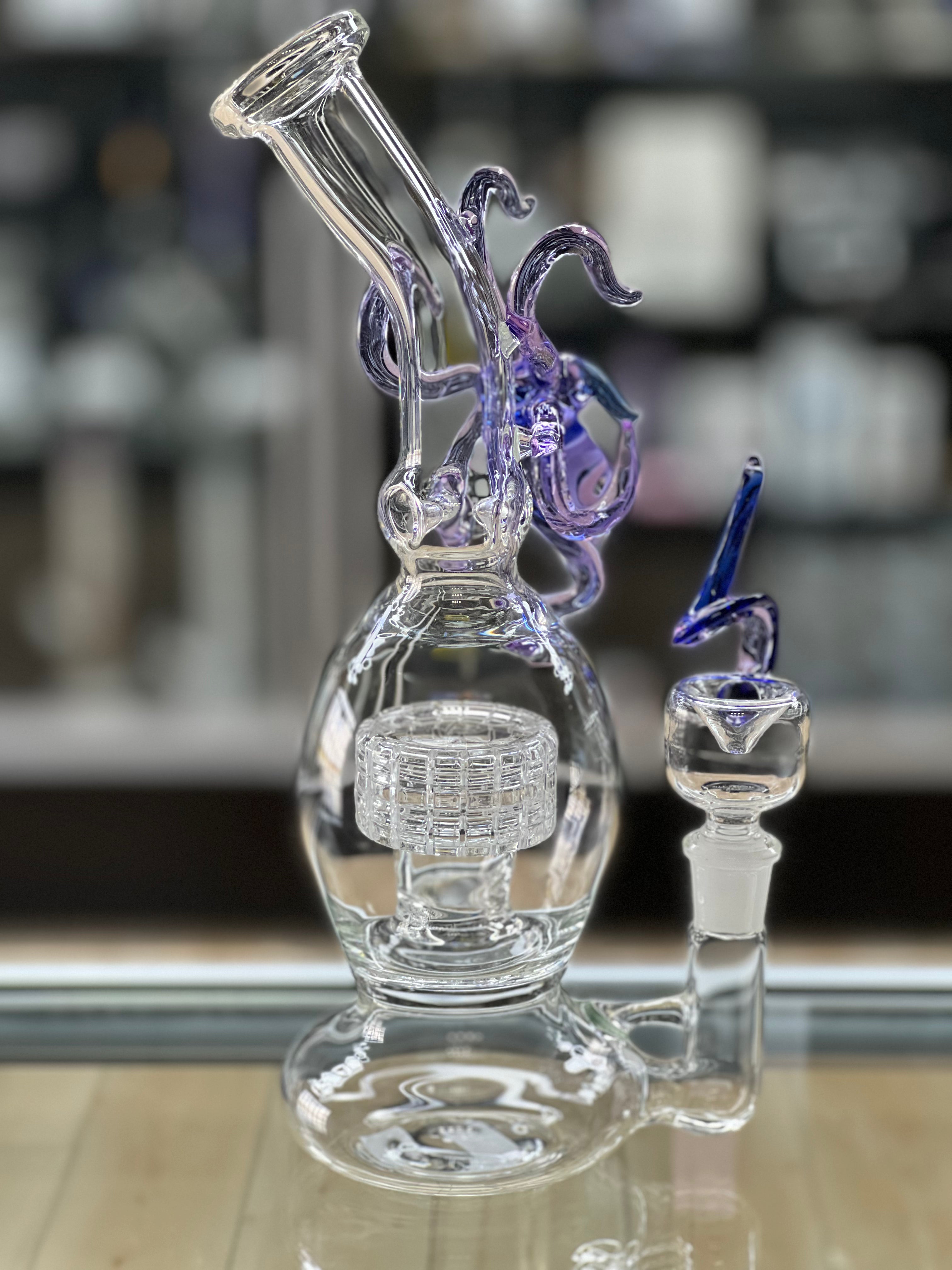 angled pic of the otg glass squid water pipe at hex smoke shop