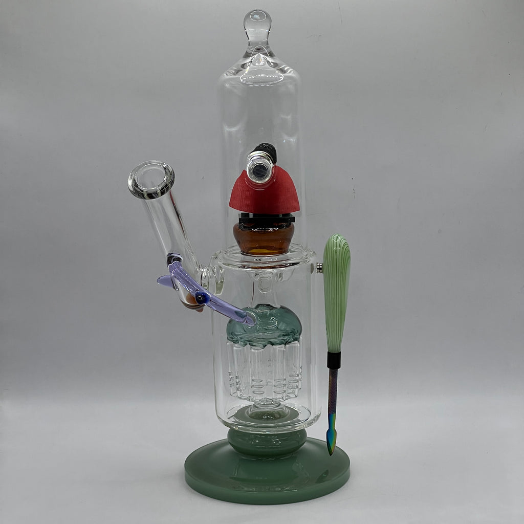 Rear angle of OTG Glass Superman themed water pipe highlighting the illuminated chamber.