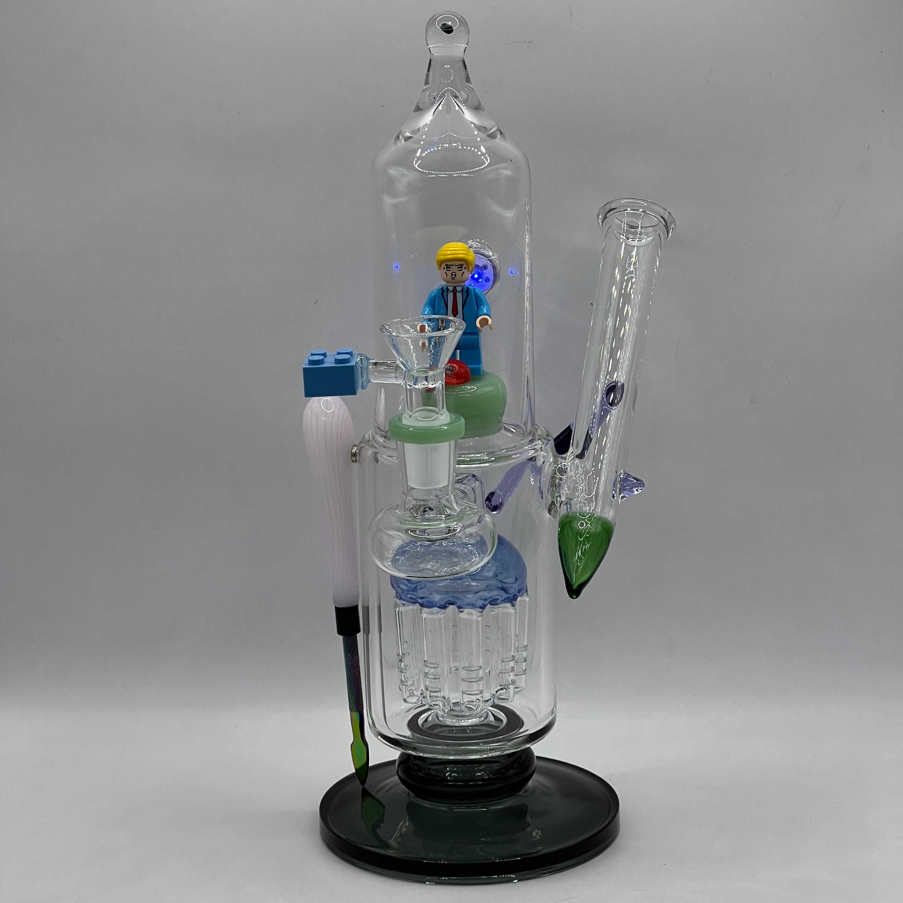 Front view of OTG Glass Trump collector water pipe with LED display chamber