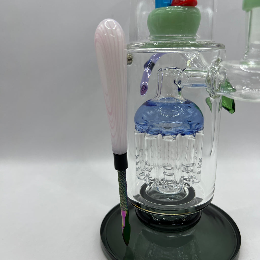Close-up of magnetic steel tool and large tree percolator