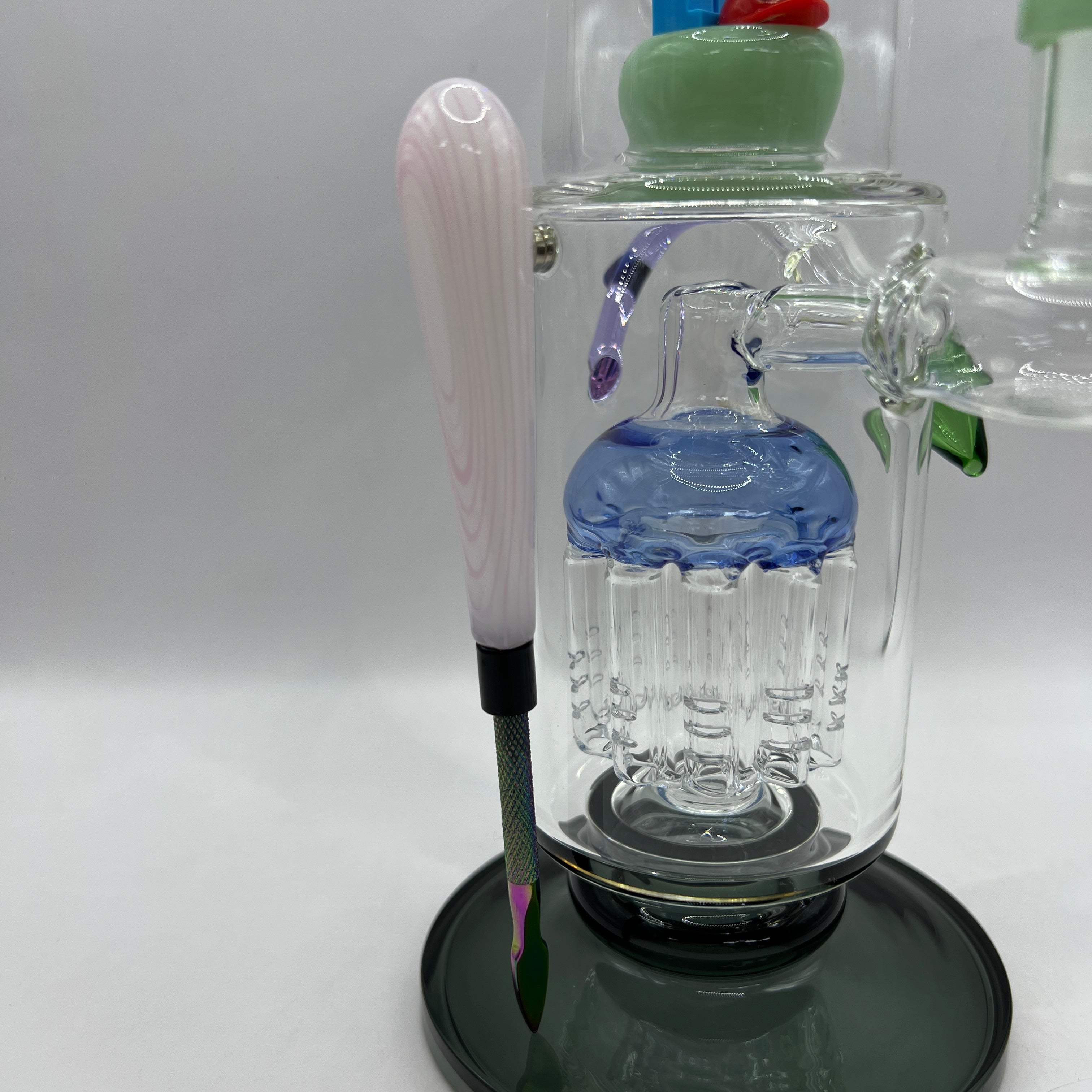 Close-up of magnetic steel tool and large tree percolator