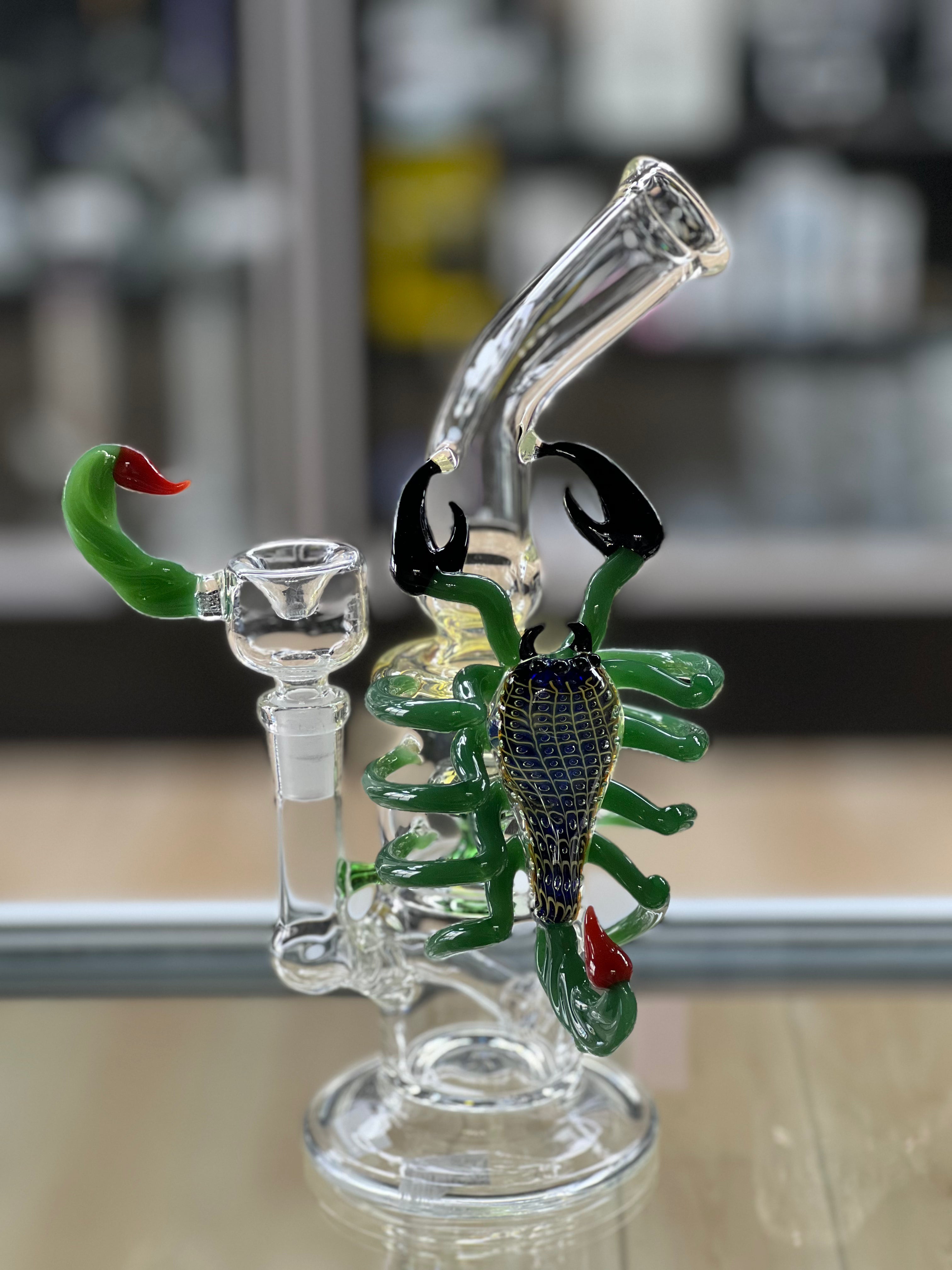 angled shot of the otg glass scorpion water pipe at hex smoke shop