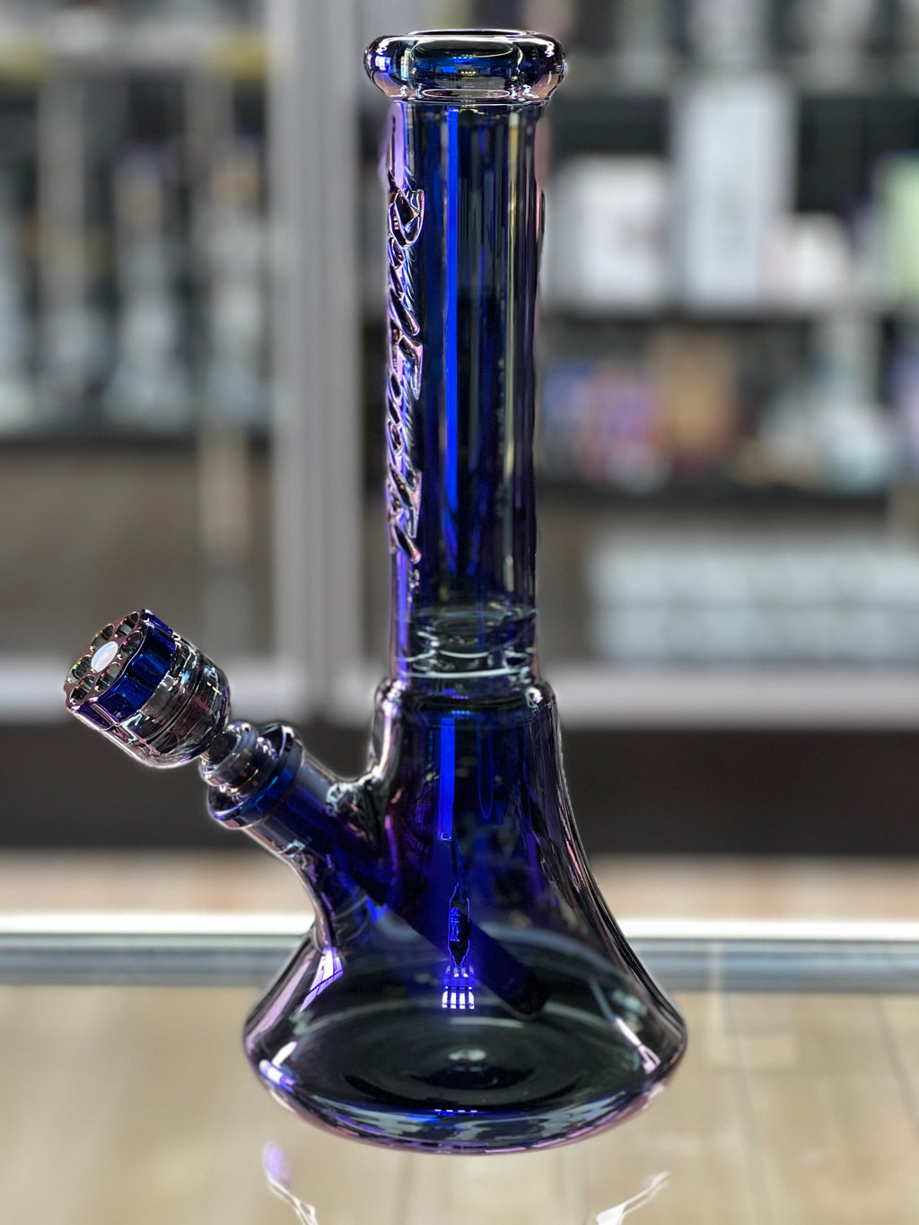 Side profile of Red Eye Tek Revolution metallic water pipe