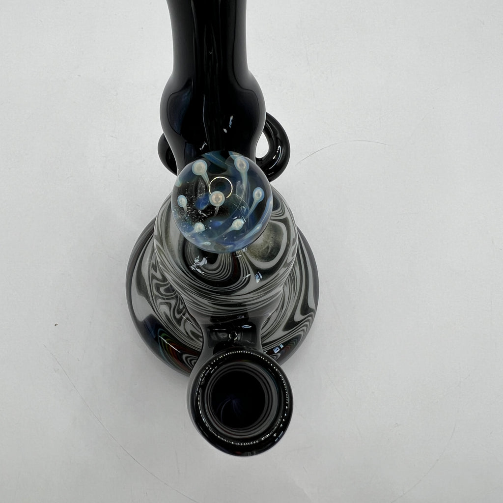 Top view showing dual encased marbles