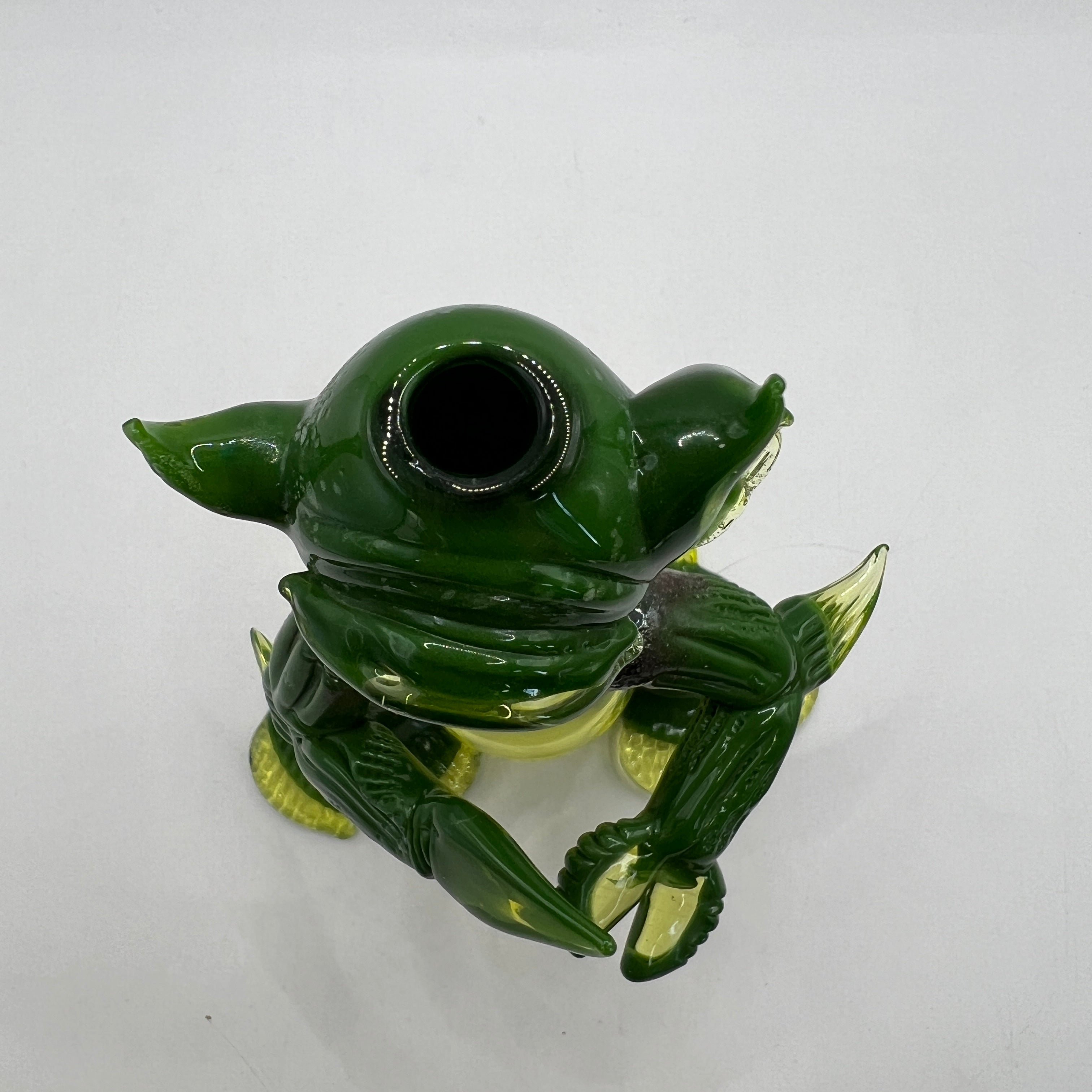 Top view showing sculpted head and claws