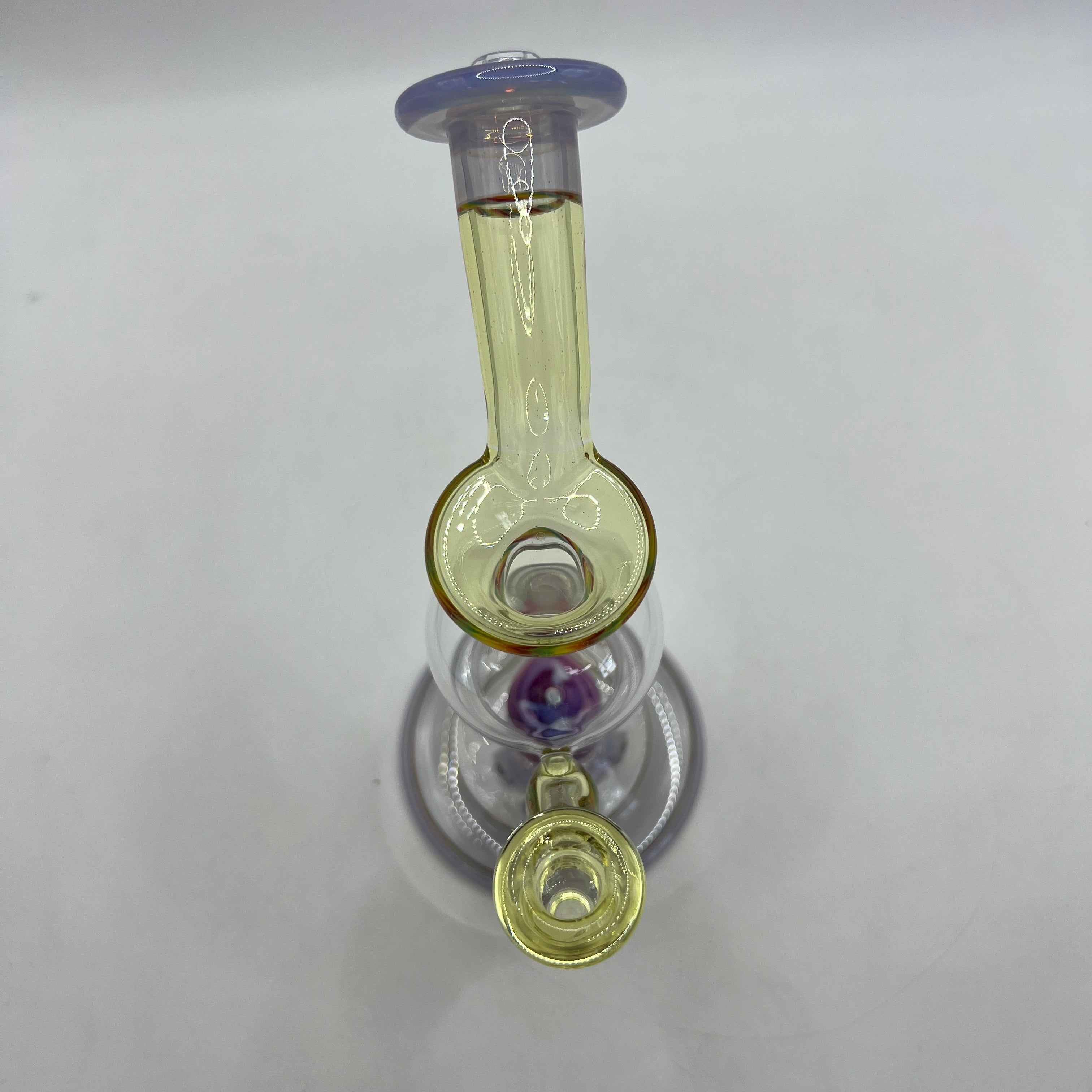 Angled view highlighting floating chamber and vortex marble